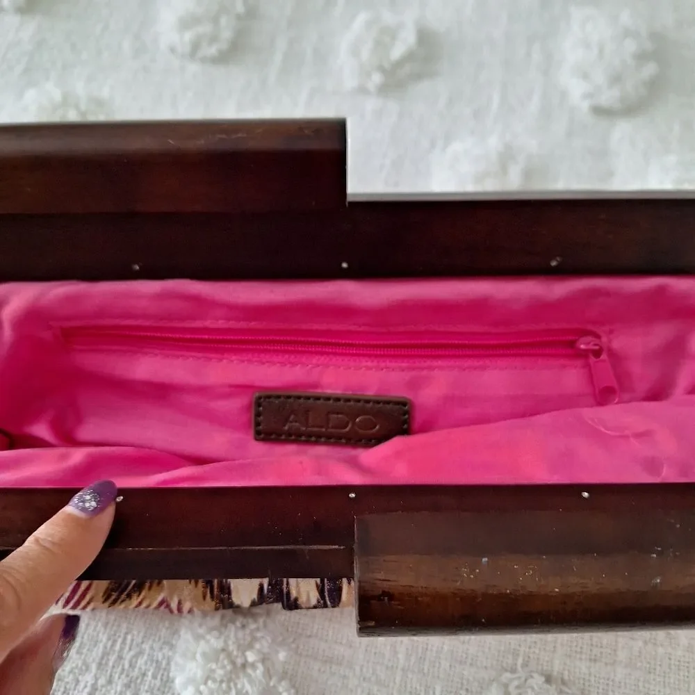 Aldo clutch shimmery multicolor fabric with wood handle